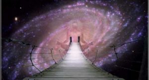 A narrow footbridge leads toward a bright opening in a purple spiral galaxy. Dark silhouettes stand near the far end of the bridge. Constellation-like lines and star points overlay the cosmic background.