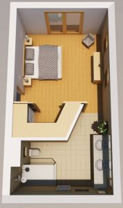A top-down interior rendering shows a compact rectangular studio-like room. A bed and small seating area occupy the upper section, while a bathroom and counters sit below. Pale wood flooring contrasts with gray walls and white fixtures.