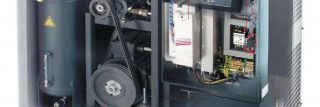 Open industrial compressor cabinet with belt drive and electrical controls.