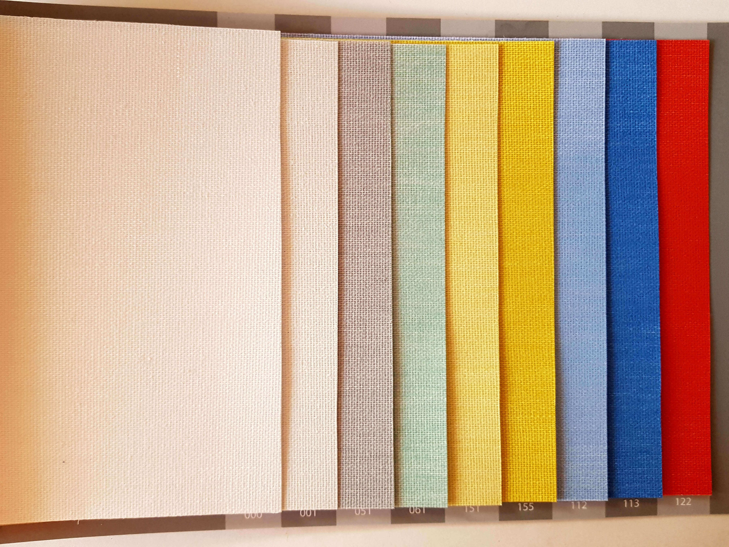 Colour swatches for vertical blind fabrics.