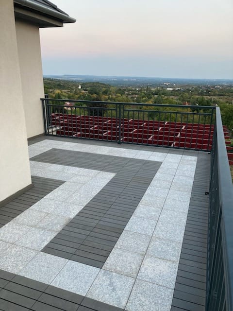 Flat roof waterproofing work viewed from above.