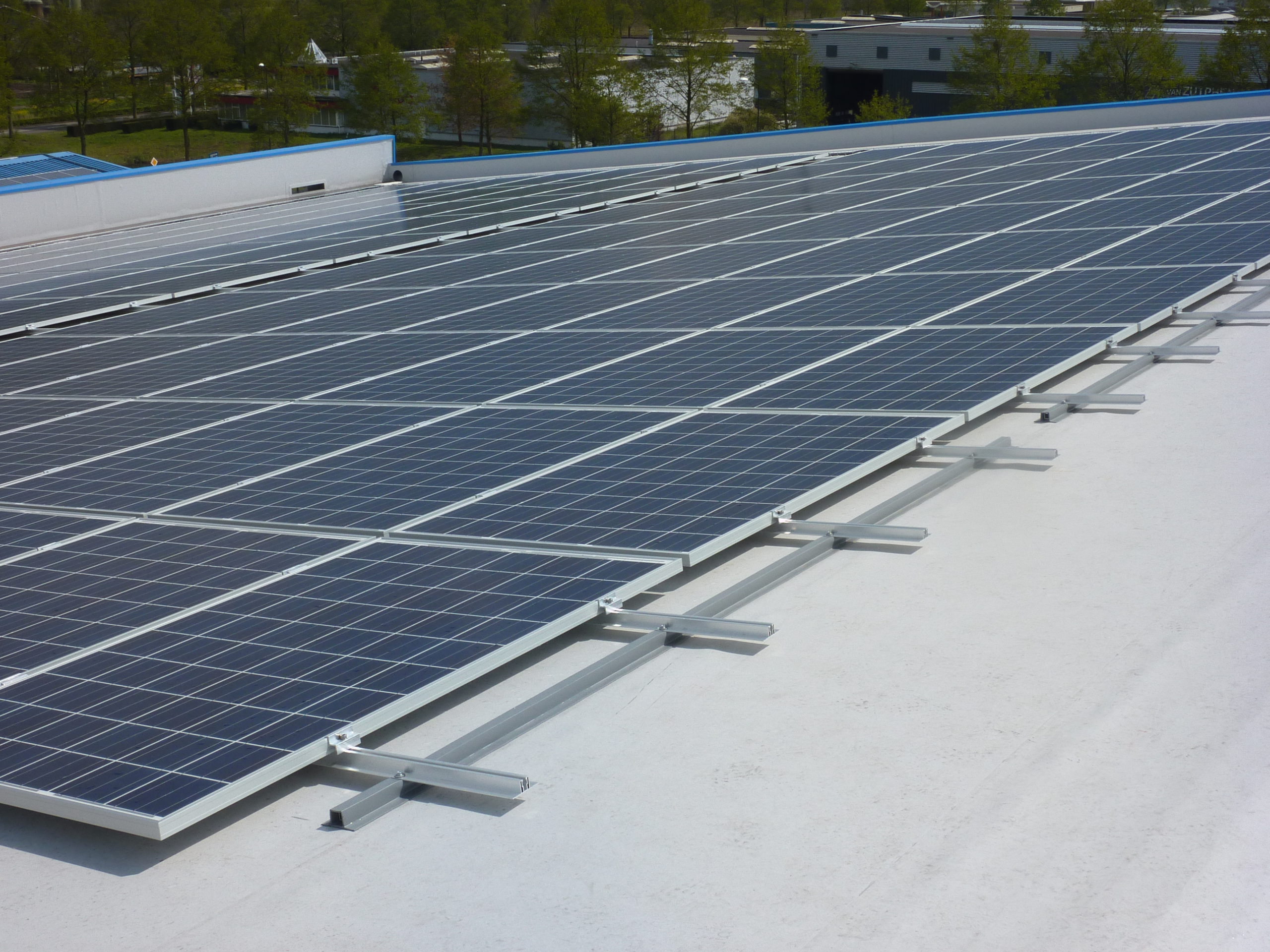 Solar panels installed on a flat roof.