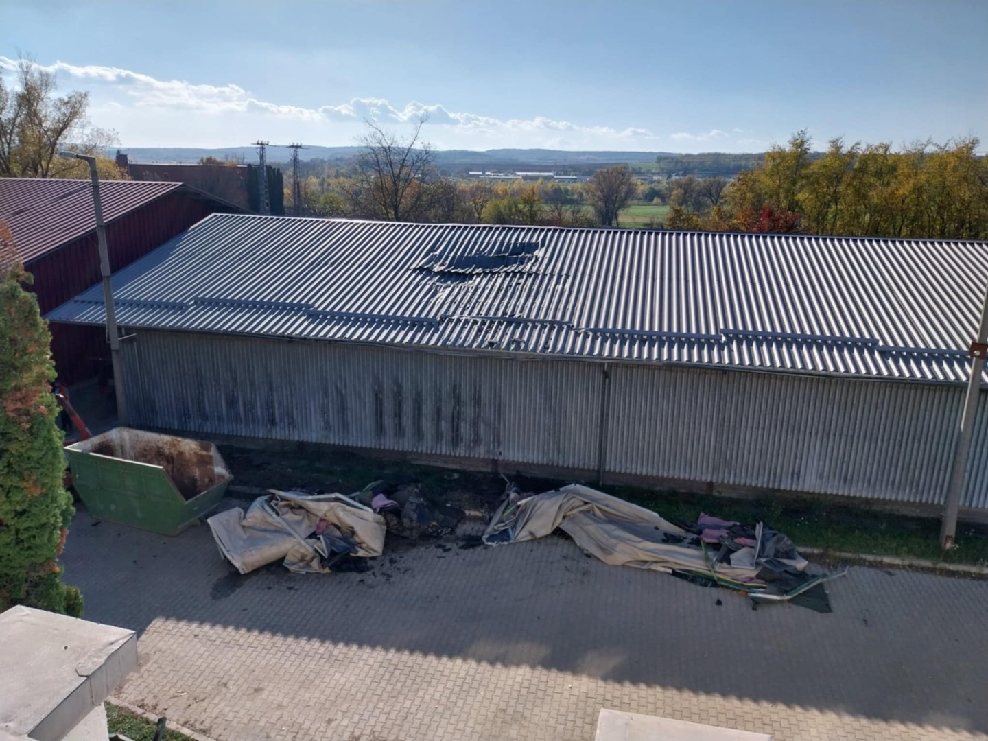 Flat roof waterproofing work viewed from above.