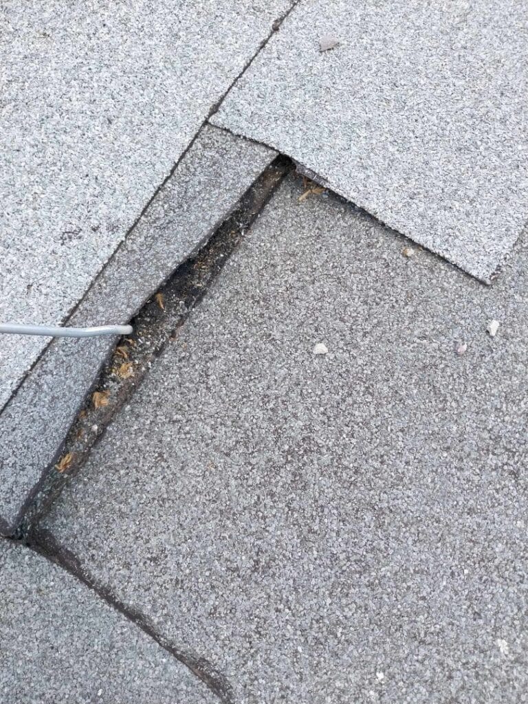 Flat roof waterproofing work viewed from above.