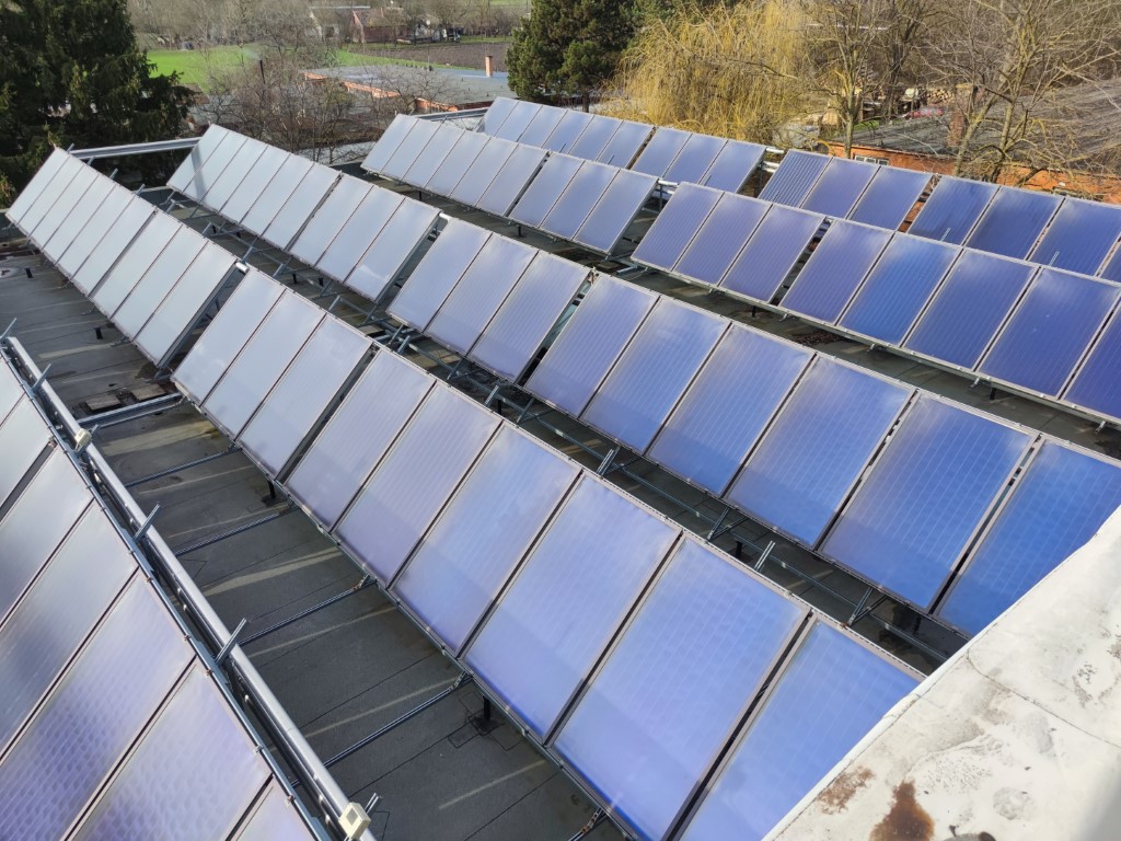 Flat roof waterproofing work viewed from above.