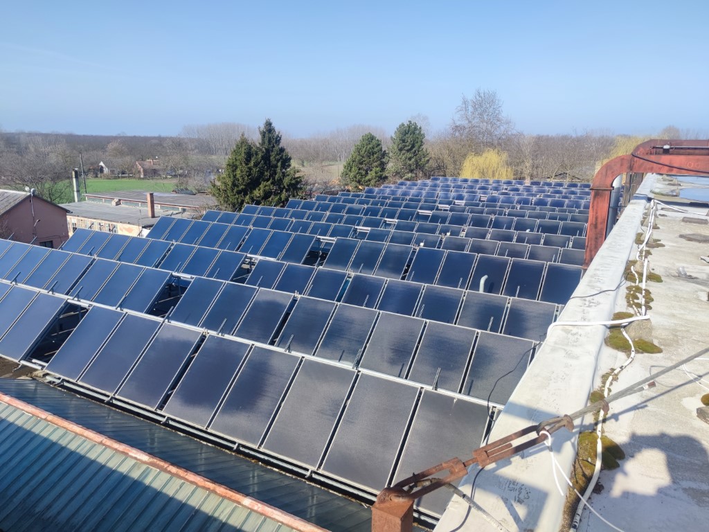 Flat roof waterproofing work viewed from above.