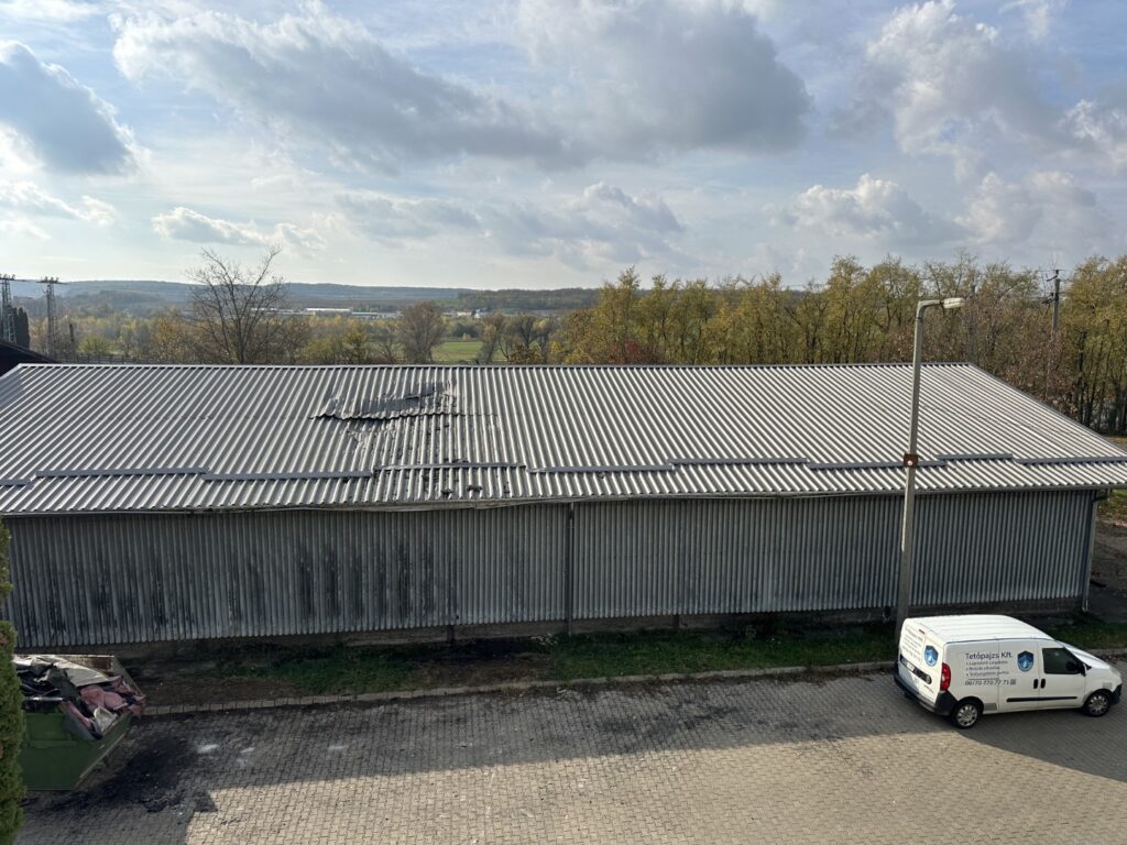 Flat roof waterproofing work viewed from above.
