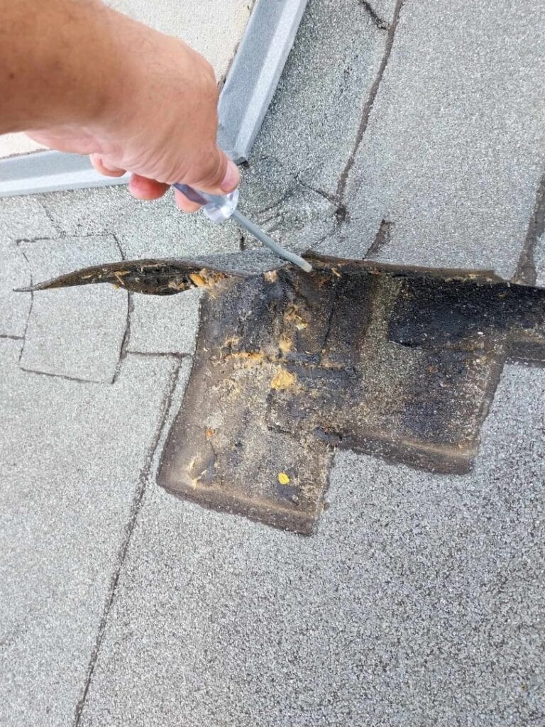 Flat roof waterproofing work viewed from above.