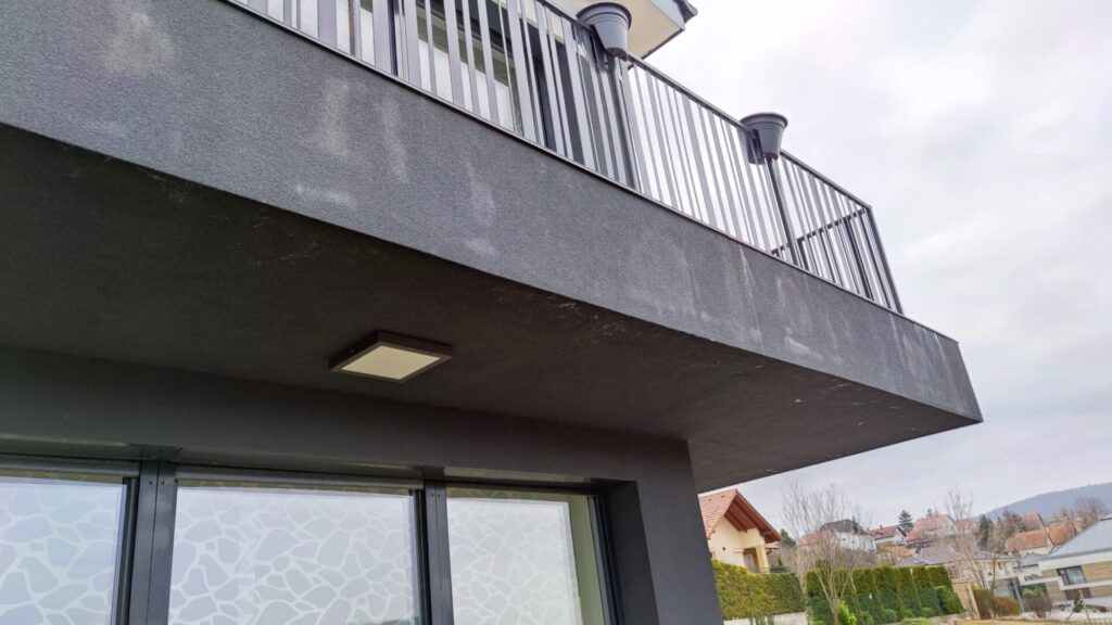 Flat roof waterproofing work viewed from above.