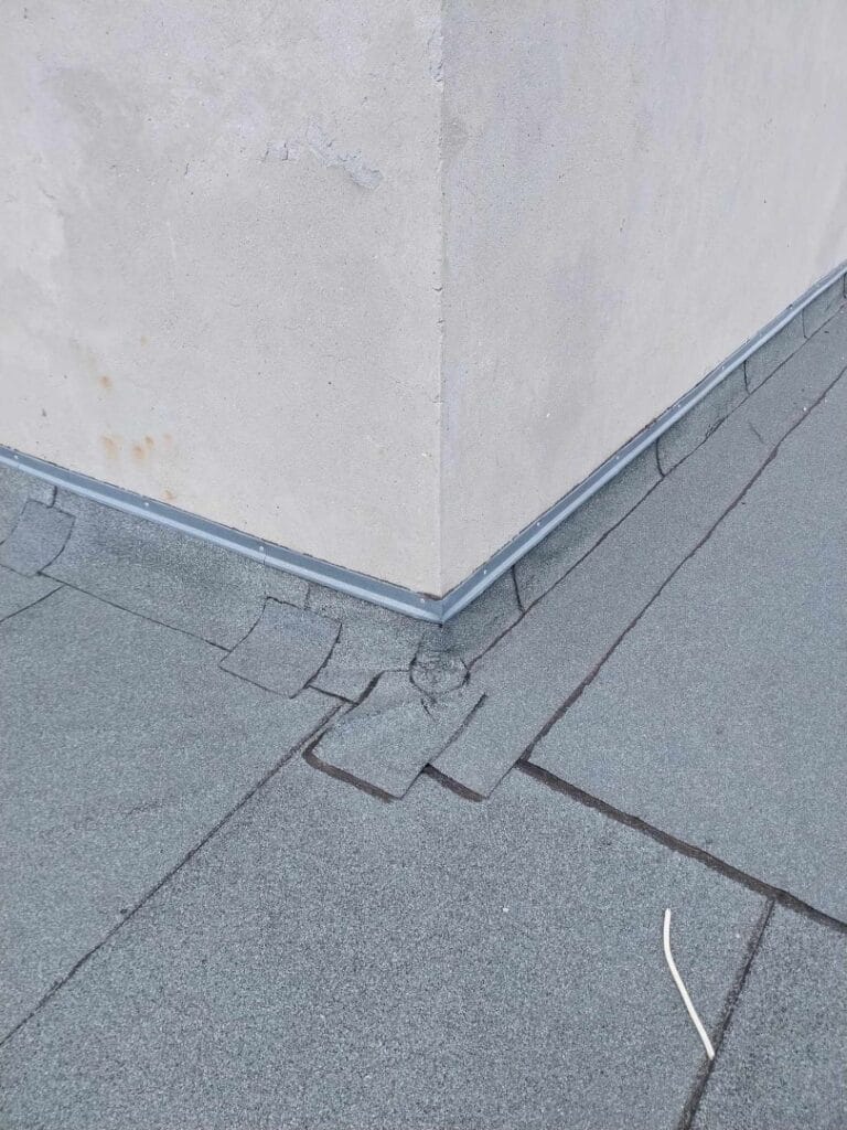 Flat roof waterproofing work viewed from above.