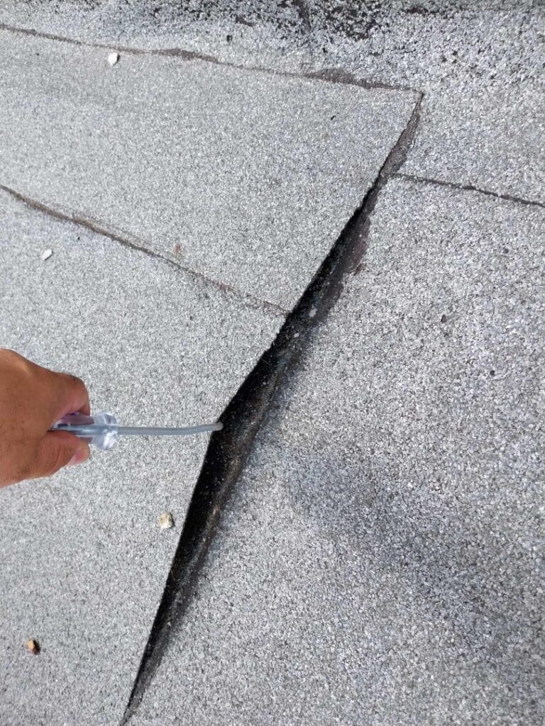 Flat roof waterproofing work viewed from above.