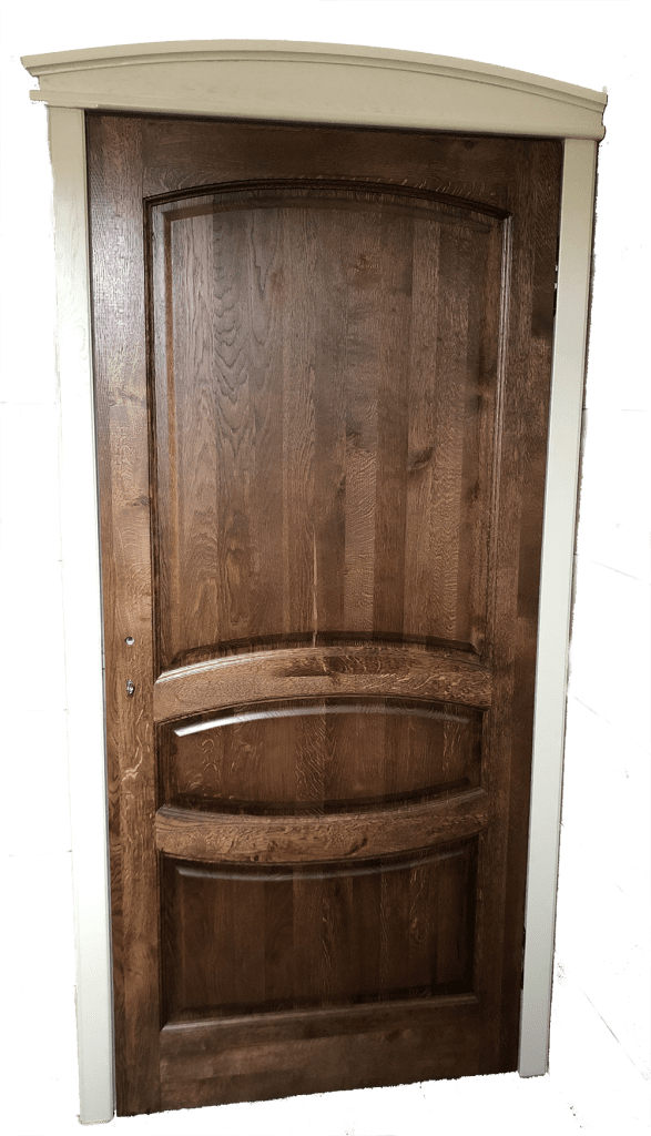 Arched wood door and frame set into a green wall.