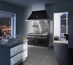 Black-and-wood kitchen with island seating.
