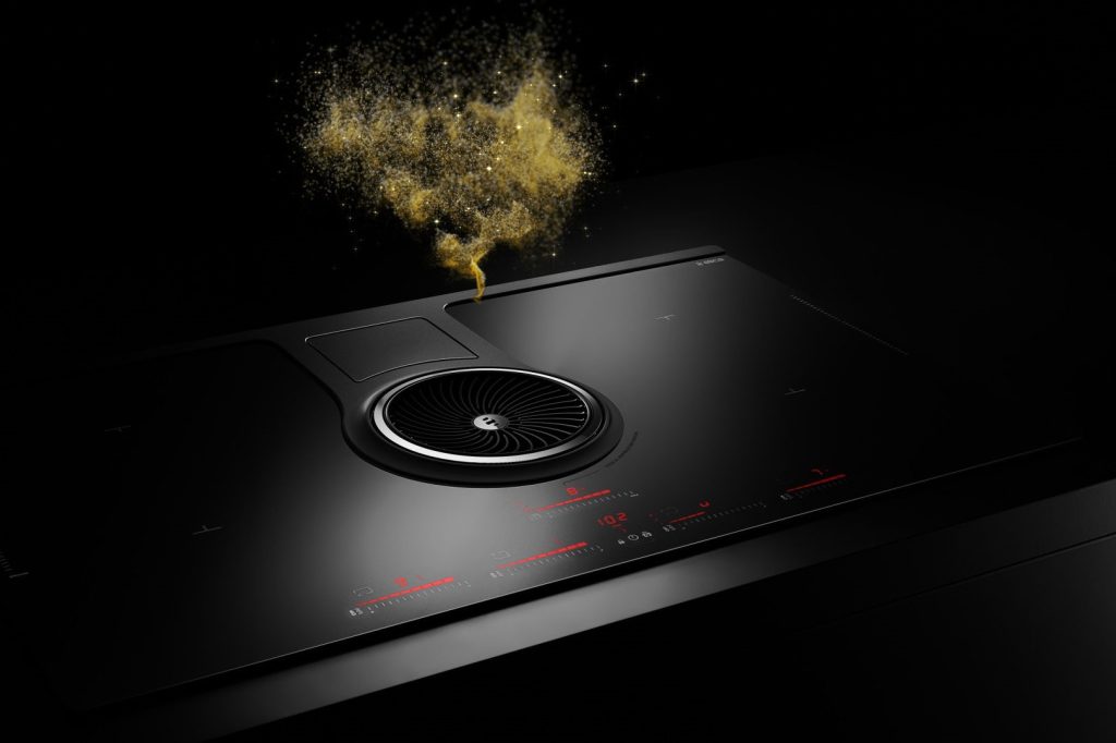 Black glass cooktop with circular zone and red glowing accent.