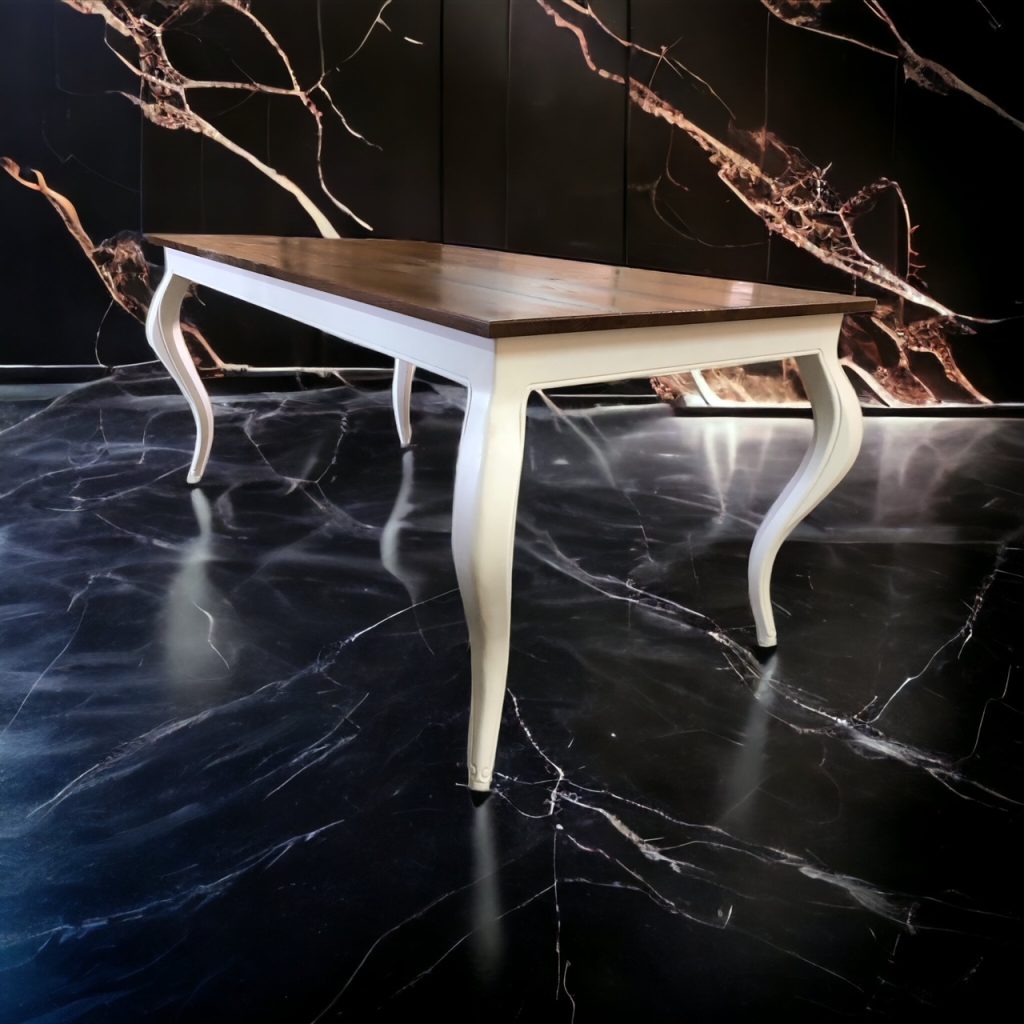 Black oval table with curved legs.