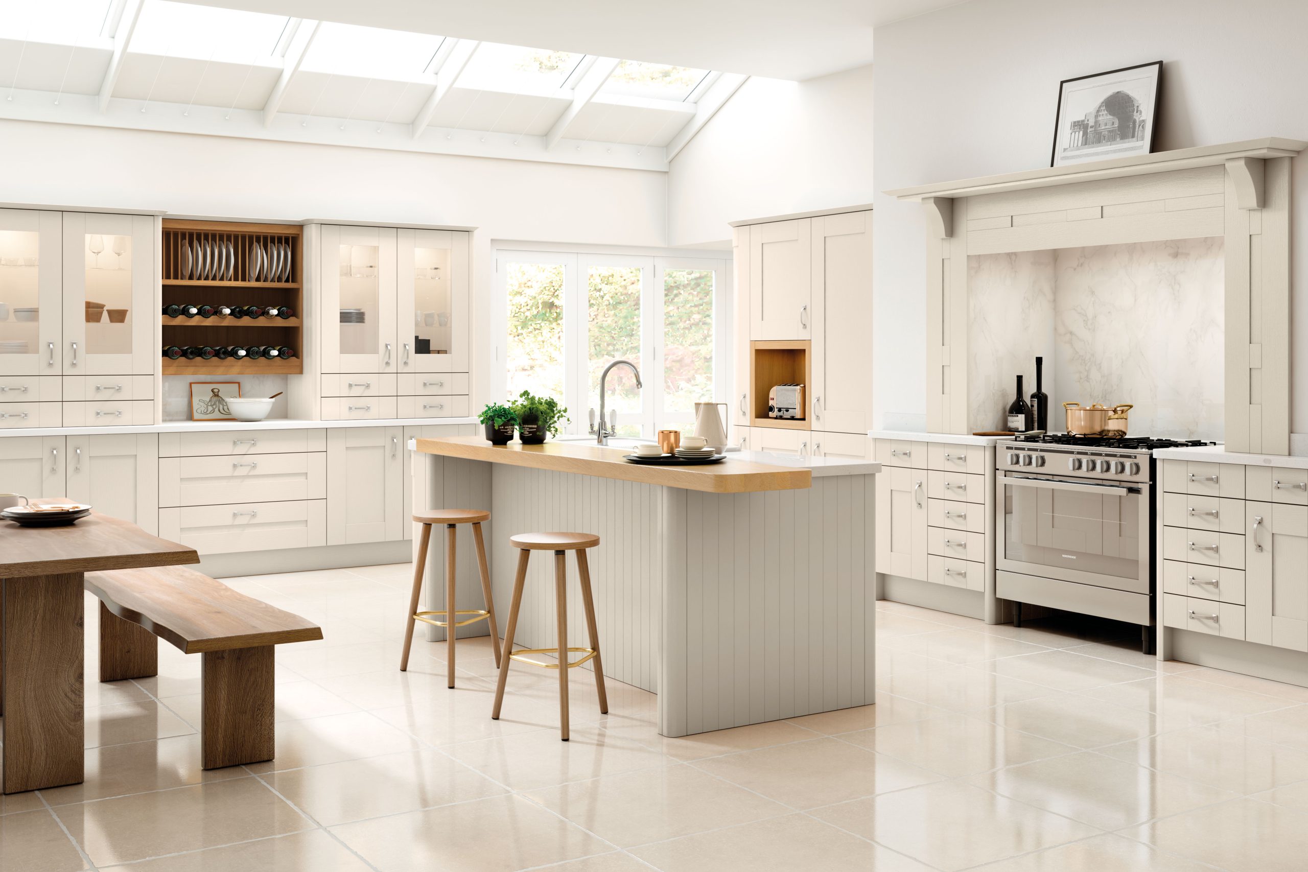 Bright white kitchen with long island.
