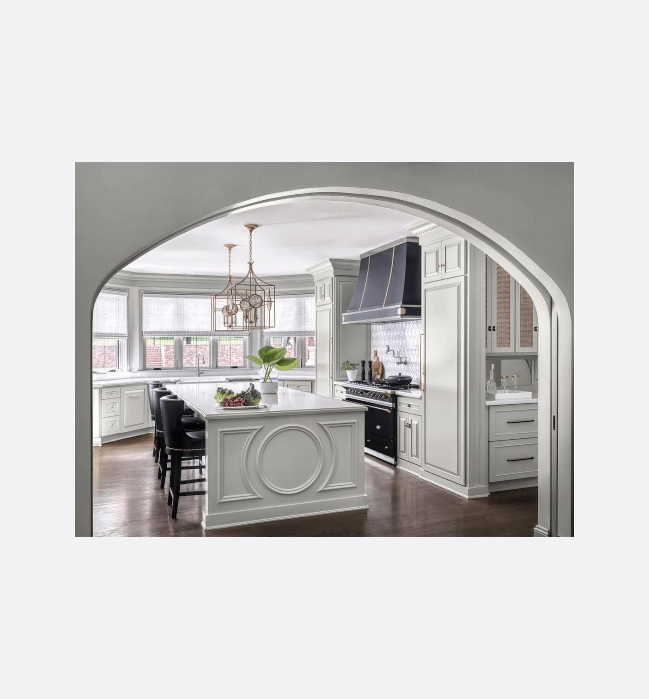 Compact kitchen with dark red range.