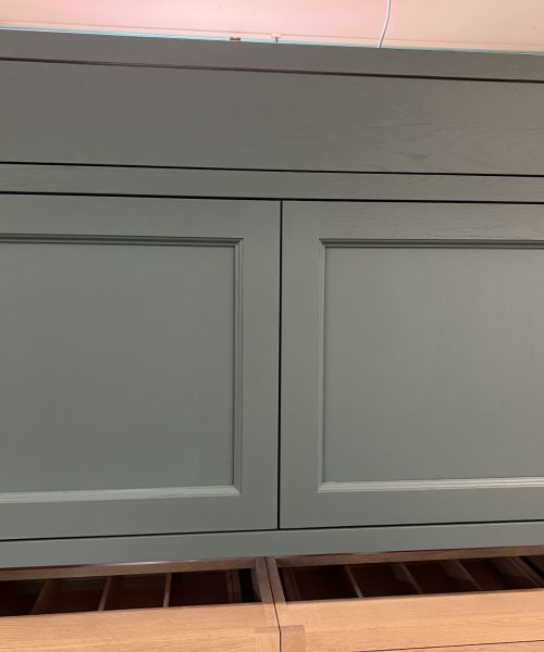 Gray cabinetry drawer and lower rail.