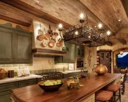 Pale blue kitchen with bright blue hood.