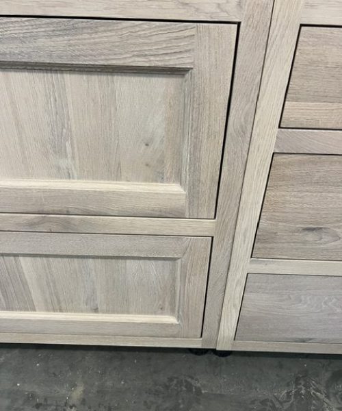 Pale cabinet corner with side stile.
