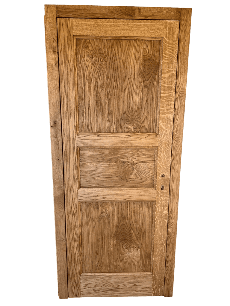 Tall wooden panel door with raised rectangles.