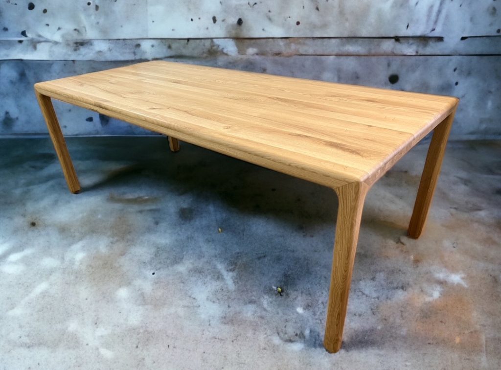 Warm wood table with angled legs.
