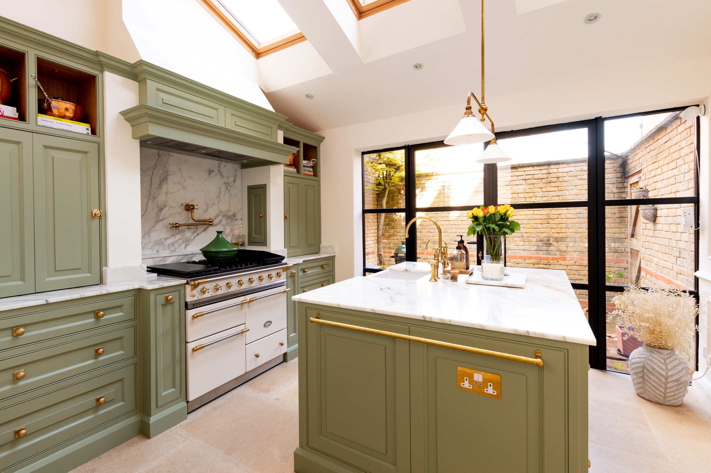 White inset kitchen with open doorway.