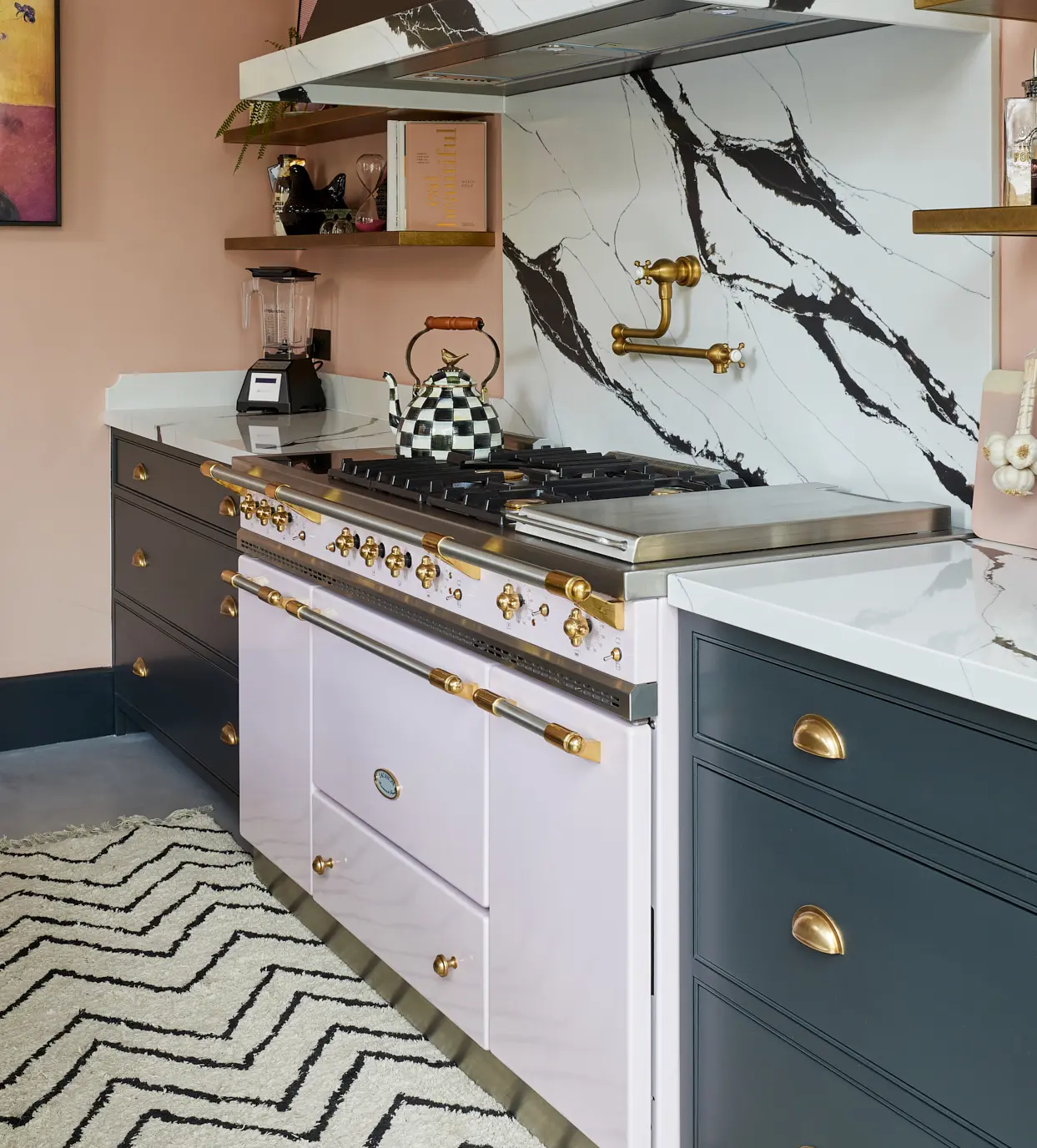 White kitchen with blue-gray cooking wall.