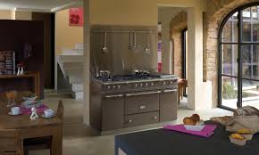 White kitchen with blue-gray lower cabinets.