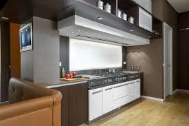 White kitchen with framed hood surround.