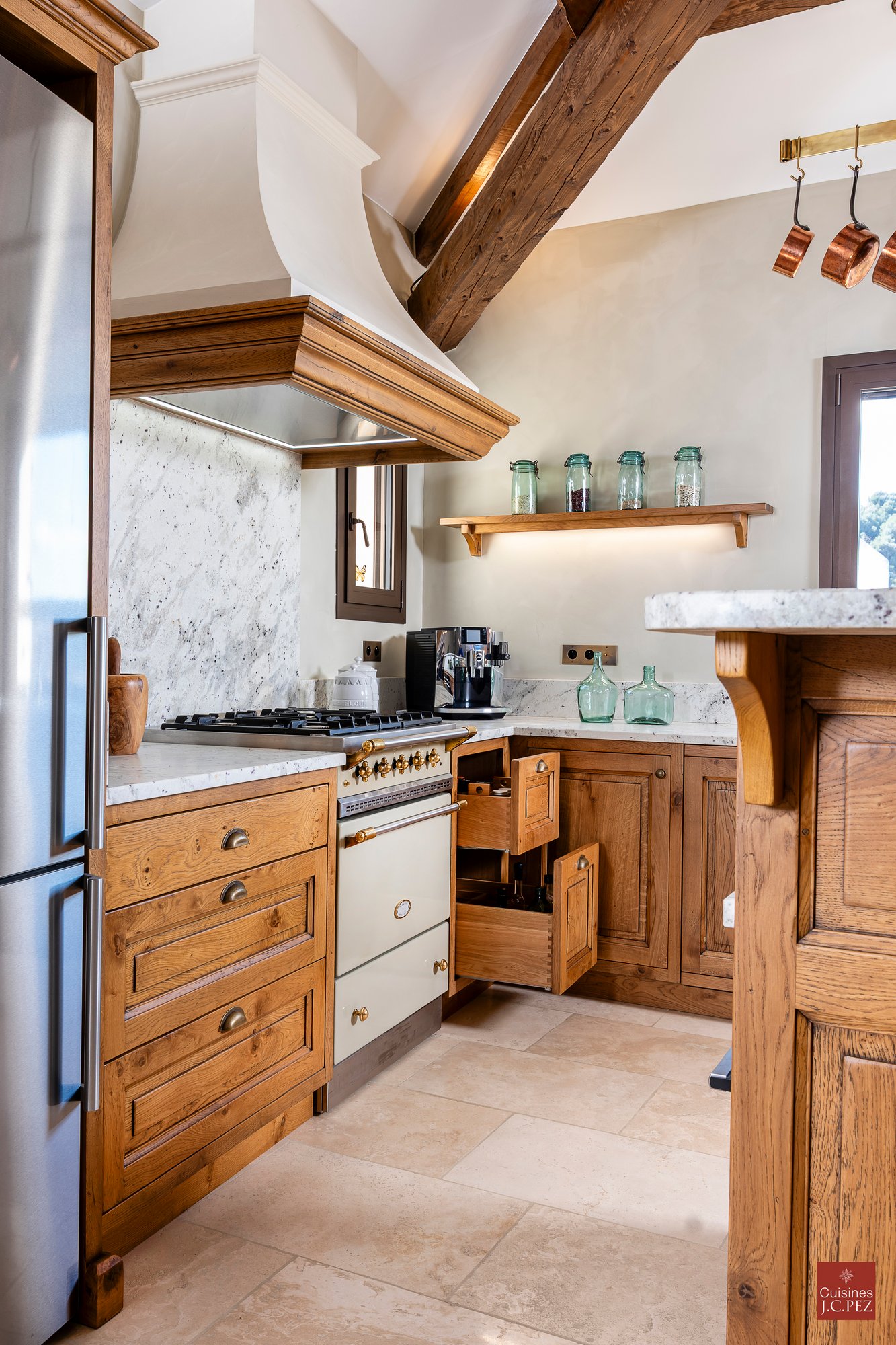 White side-angle kitchen with dark range.